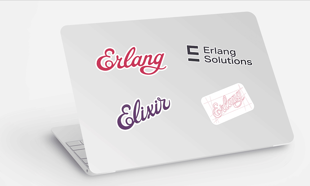 erlang and elixir stickers on laptop
